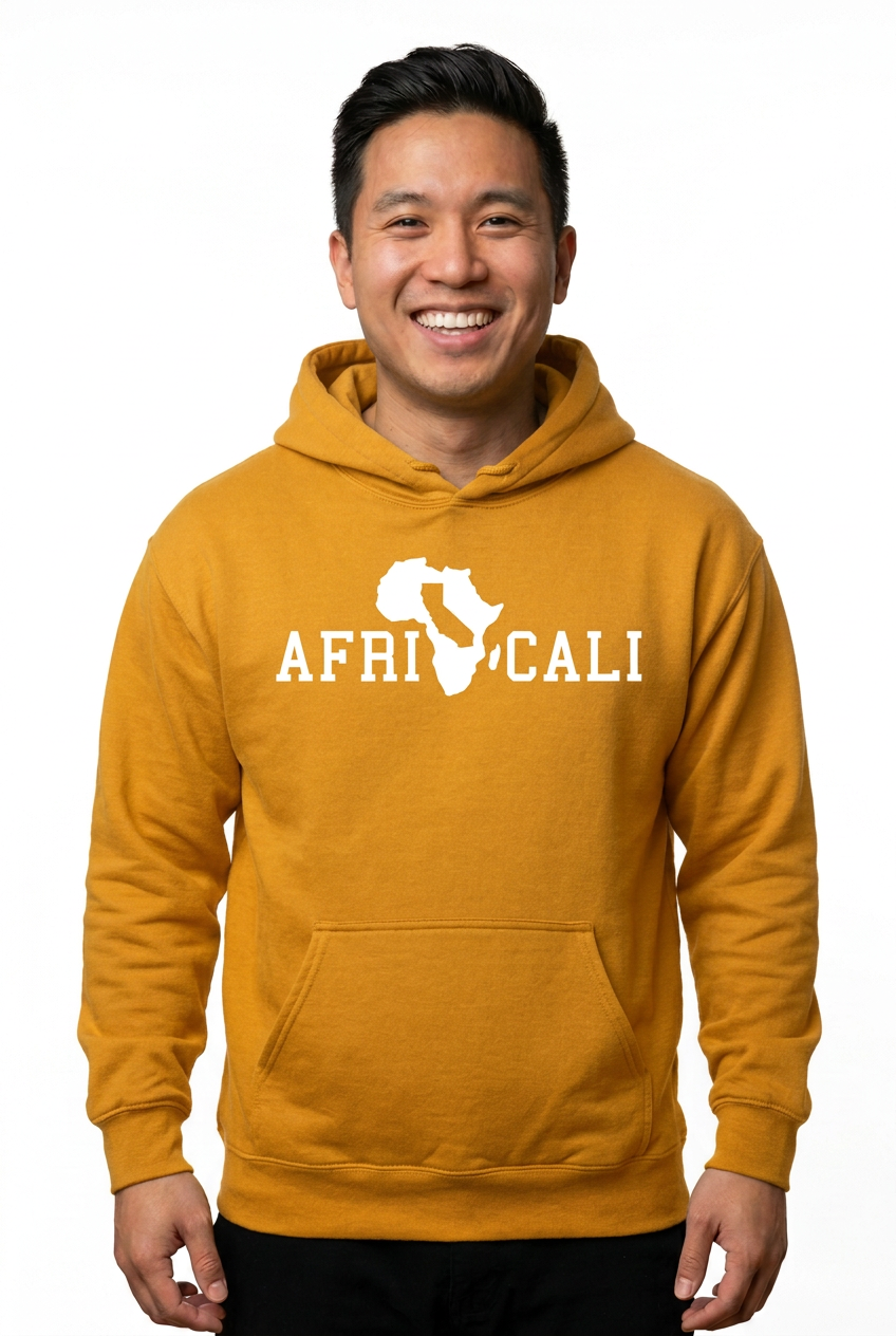 Asian American man wearing gold Unity hoodie on white background