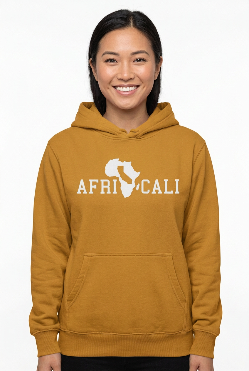 Asian American woman wearing gold Unity hoodie on white background